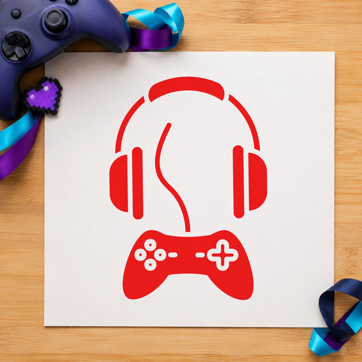 Headphones Above Wired Controller craft stamp imprint in red ink on a handmade project, one idea being guest question cards.