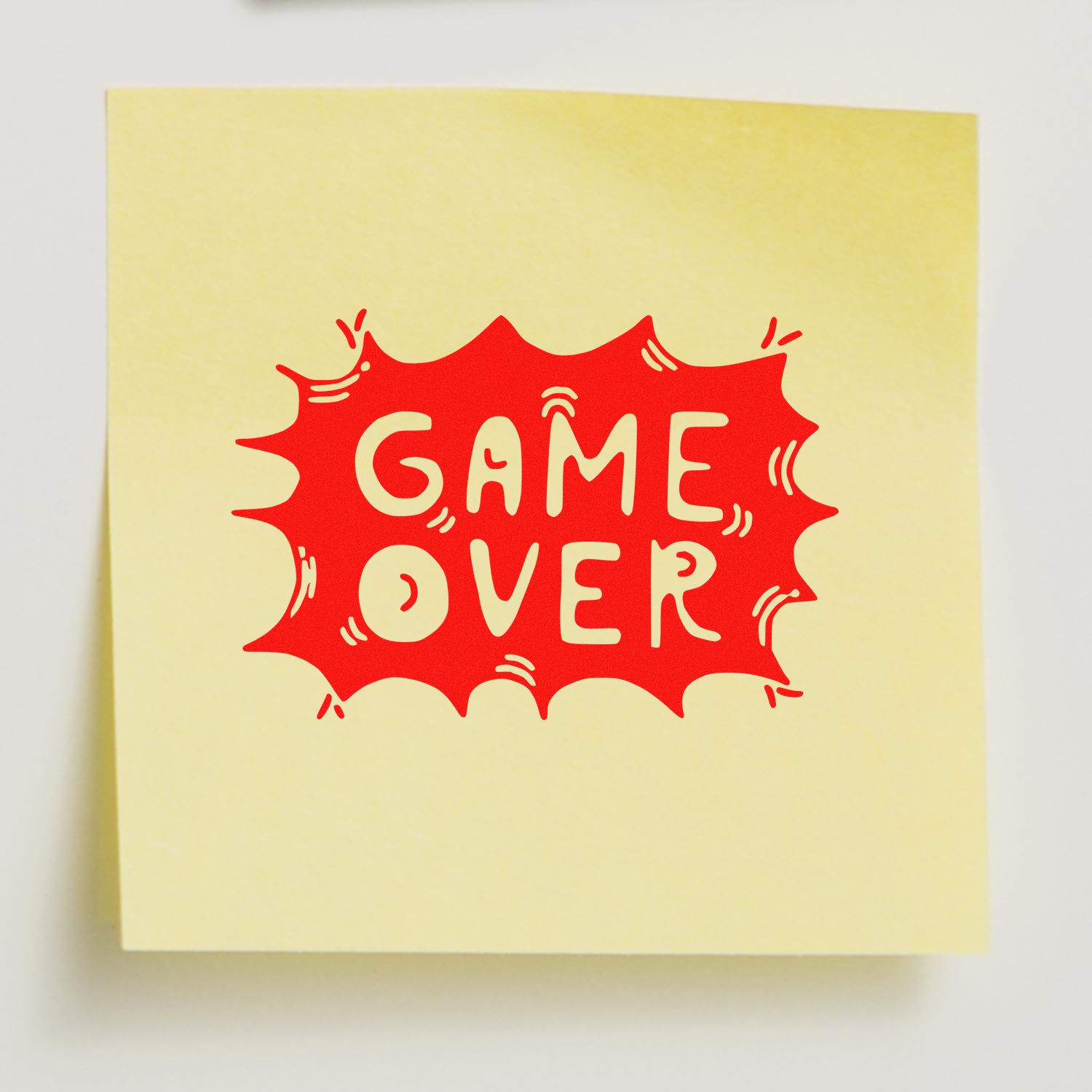 Game Over rubber stamp design in bold red comic burst, ideal for playful crafting, scrapbooking, and stationery.