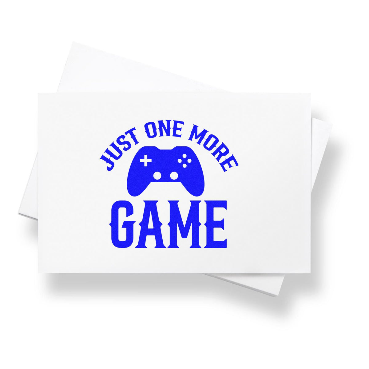Just One More Game rubber stamp with game controller icon, ideal for gamer crafts, cards, and journaling.