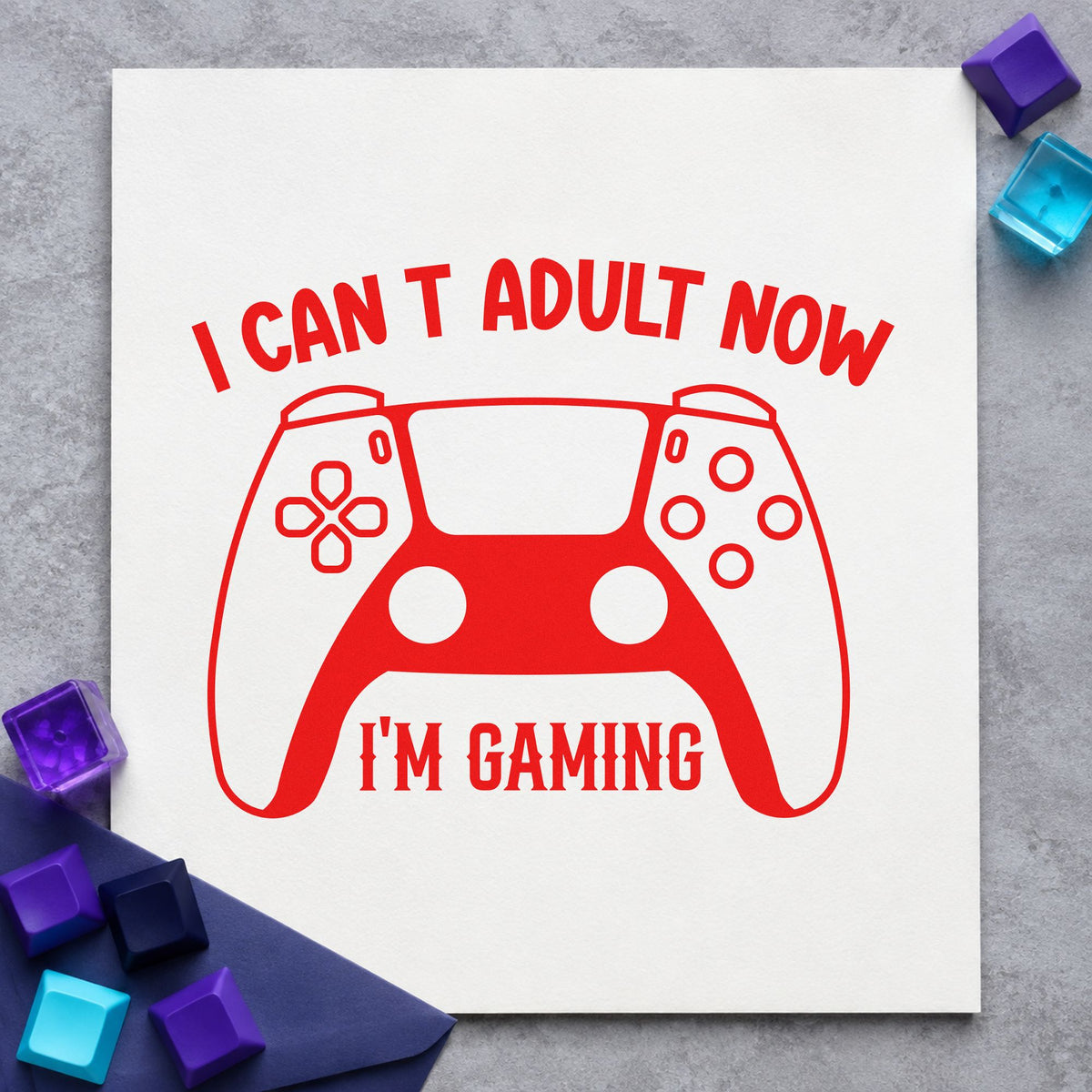 Cannot Adult Now Gaming craft stamp imprint in red ink on a handmade project, one idea being chore plan cards.