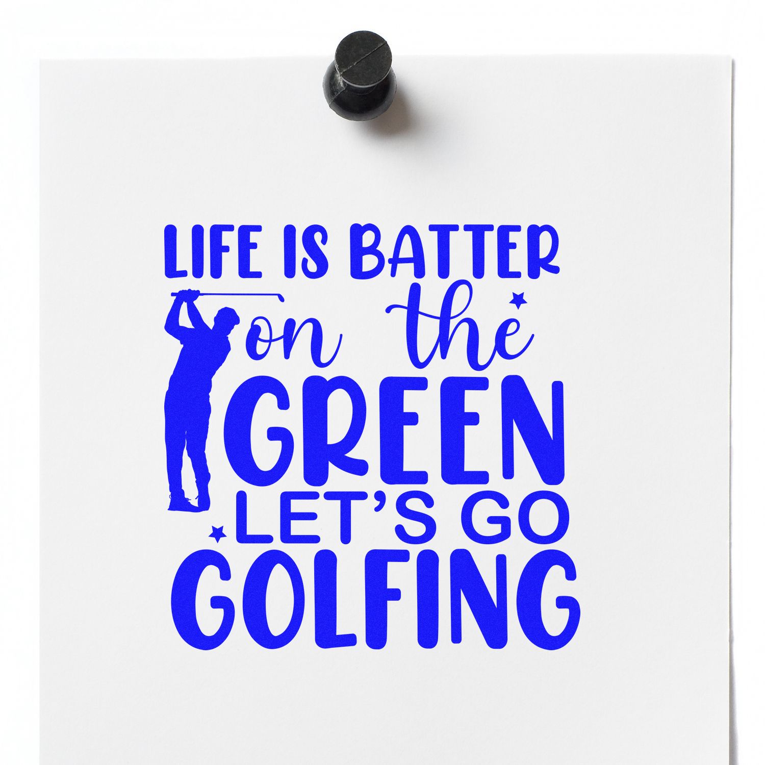 Golf-themed rubber stamp impression in blue ink reading Life is better on the green, lets go golfing with golfer silhouette.