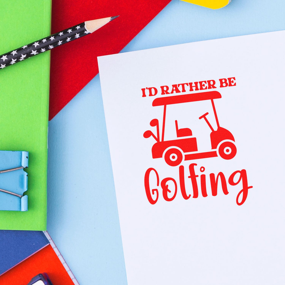 Golf-themed rubber stamp design with Id Rather Be Golfing text and golf cart icon for DIY craft projects.