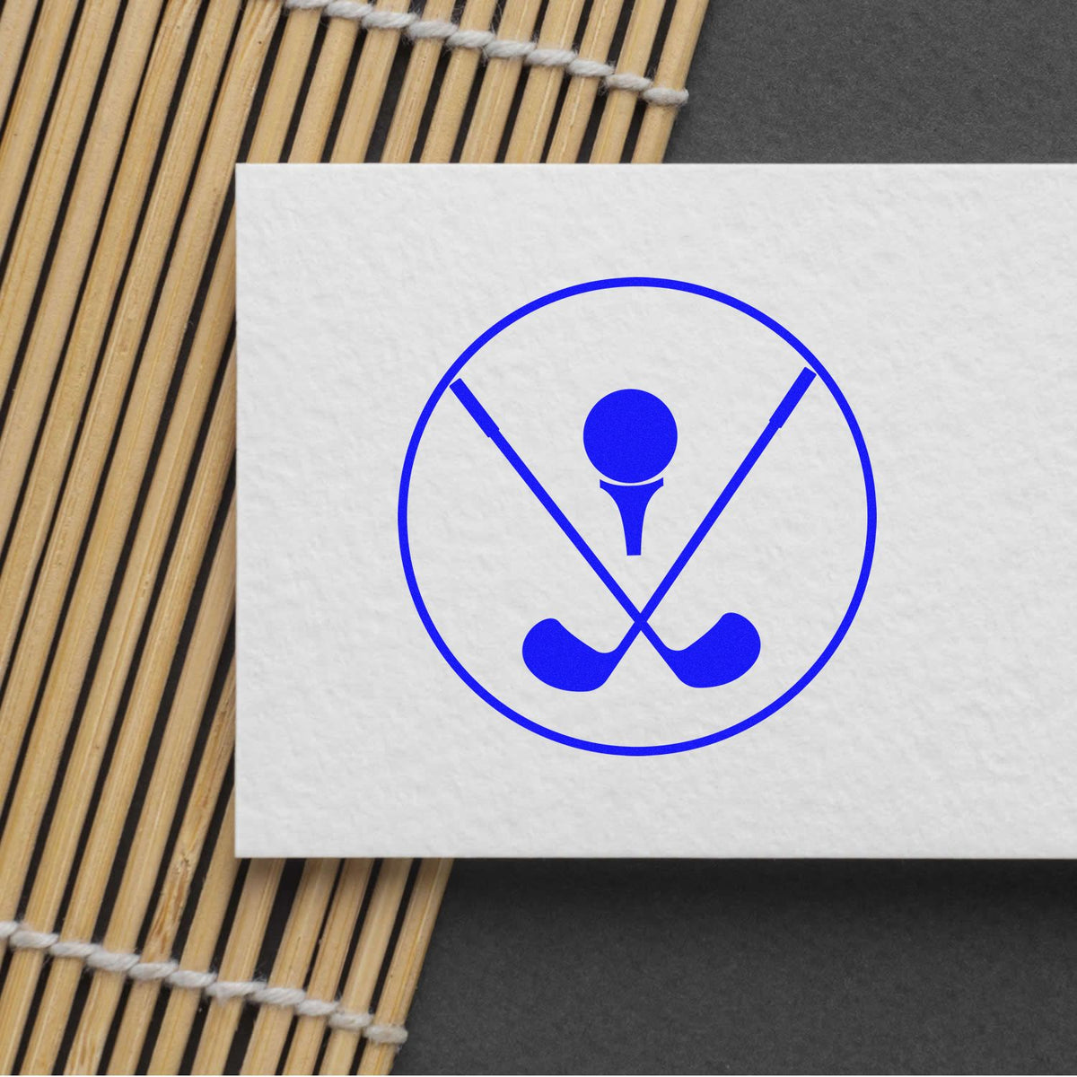 Custom golf rubber stamp logo with crossed clubs and ball printed on paper