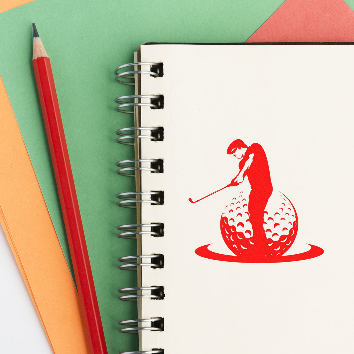 Custom golf rubber stamp design on a spiral notebook, perfect for sports-themed branding, crafts, and personalized stationery.