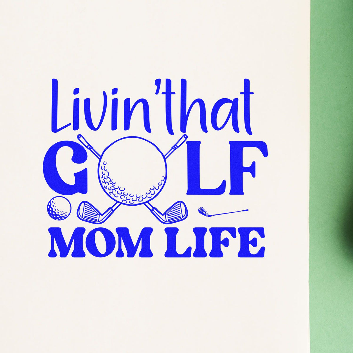 Blue golf mom life rubber stamp design with golf clubs and golf ball, featuring the phrase Livin that Golf Mom Life.