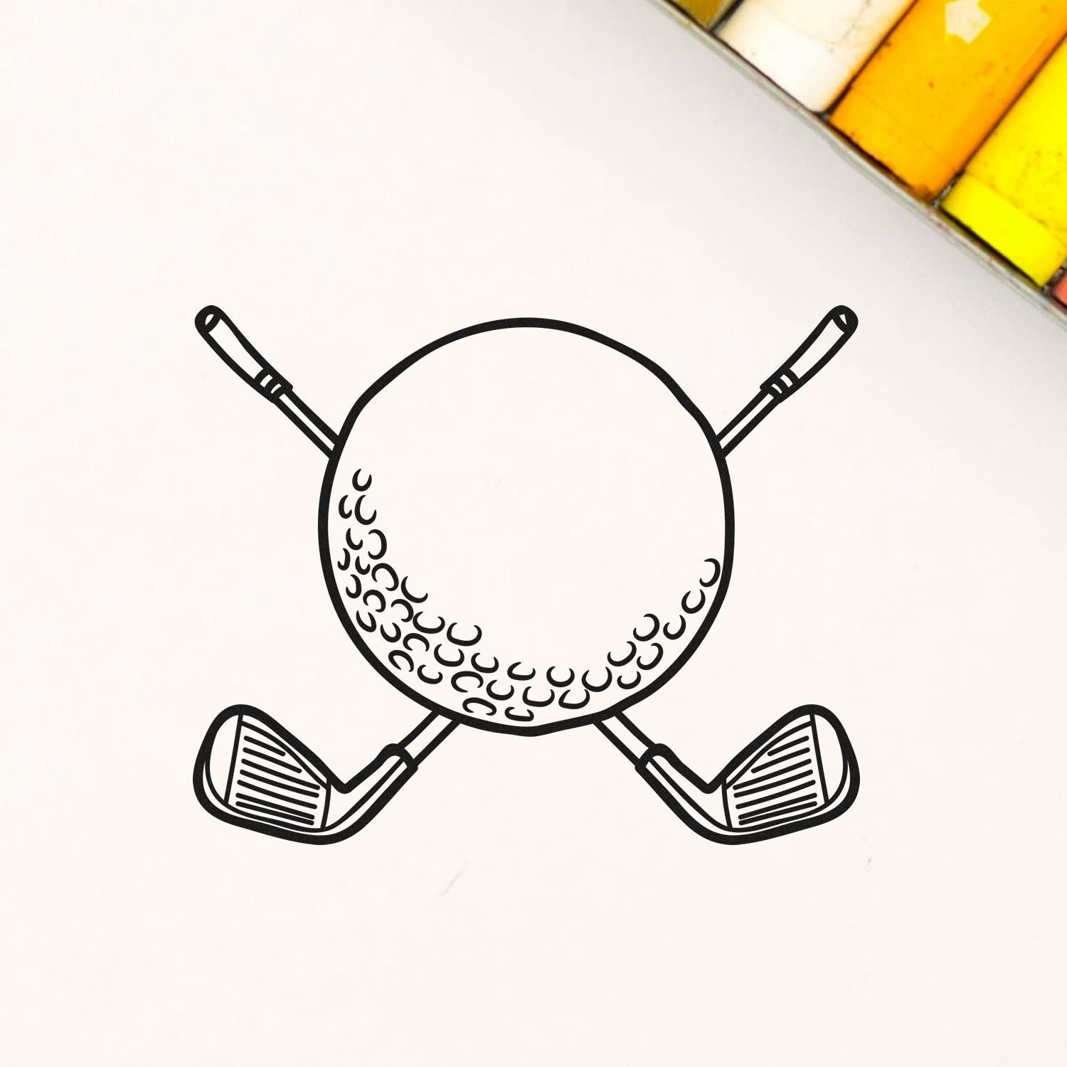 Golf ball and crossed clubs rubber stamp design for golf-themed crafting, scrapbooking, and sports stationery.
