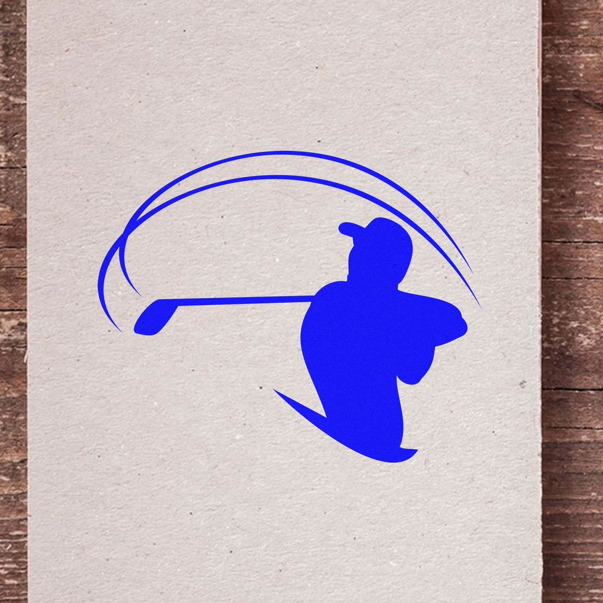 Blue golf swing rubber stamp design with golfer silhouette, ideal for sports-themed cards and custom stamping.