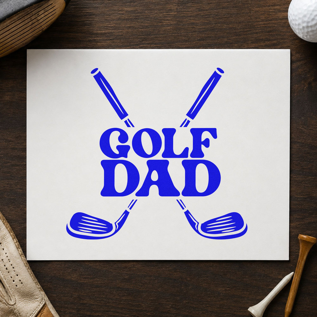 Golf Dad Crossed Clubs craft stamp imprinted in blue ink on paper, a design suited to framed garage bay.
