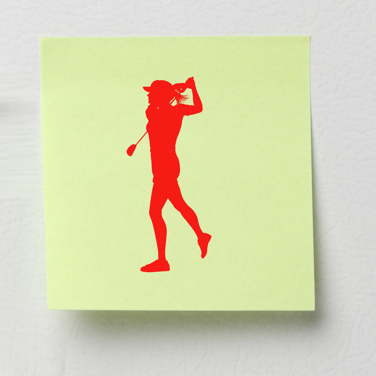 Red golfer swing silhouette rubber stamp design for custom golf stationery, crafts, and sports-themed stamping.