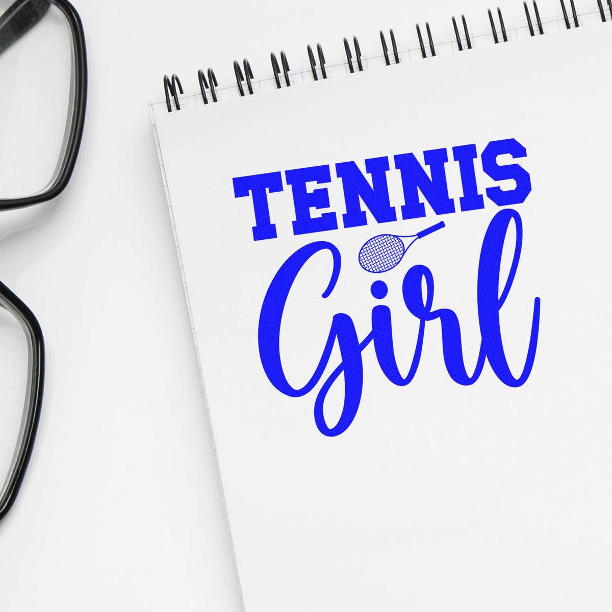 Custom Tennis Girl rubber stamp design in blue on notebook paper, ideal for sporty personalized stationery and gifts.