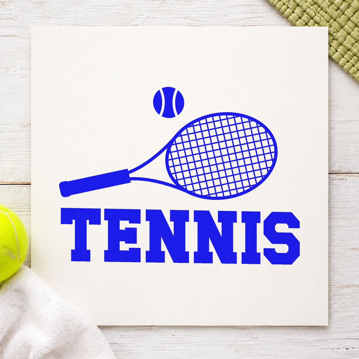 Tennis Racket And Ball craft stamp in blue ink on cardstock, an easy option for bench cloth printing.