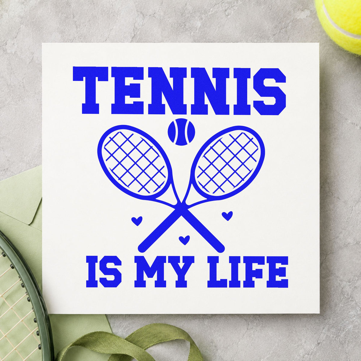 Tennis Is My Life craft stamp imprinted in blue ink on paper, a design suited to framed court fence.