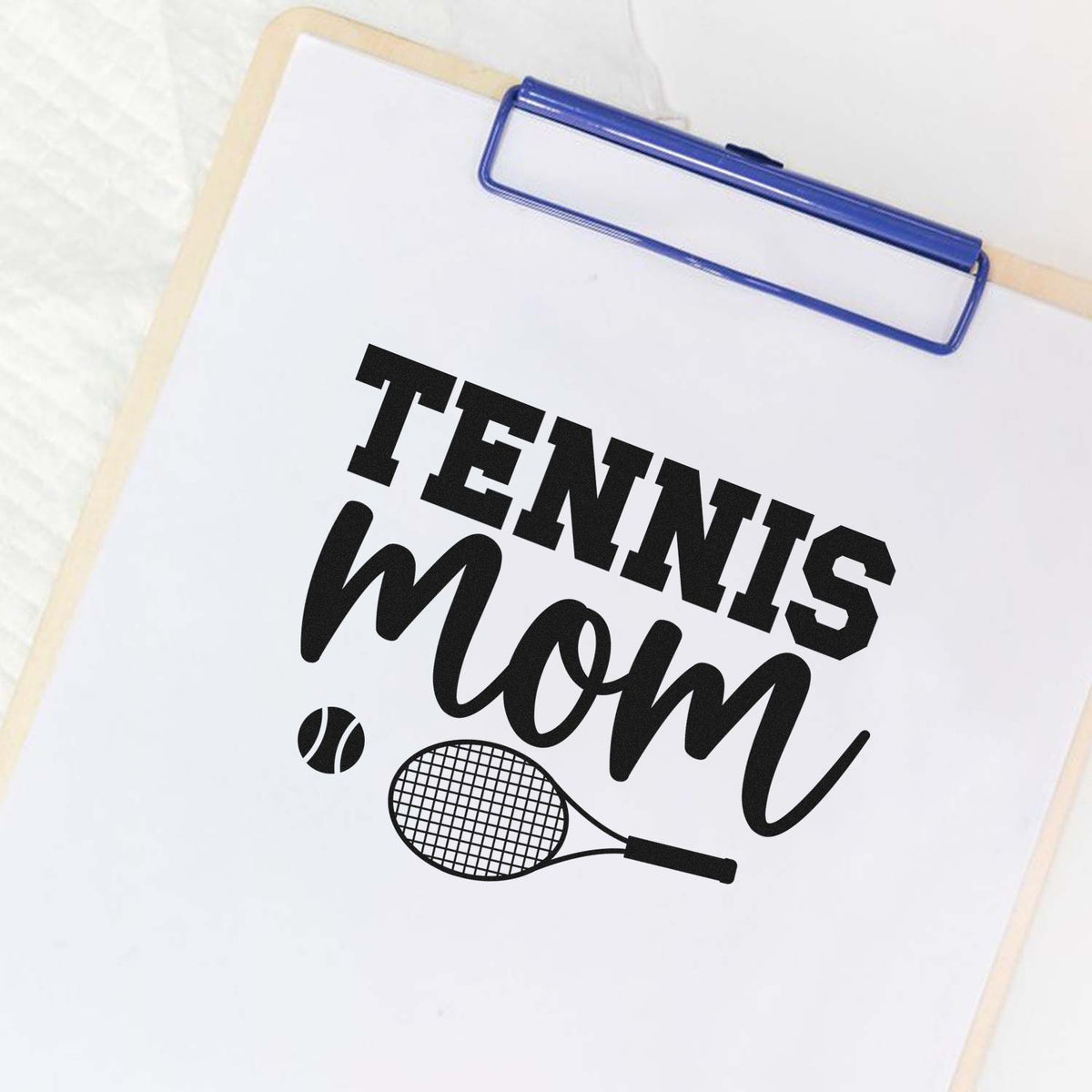 Custom Tennis Mom rubber stamp mockup with tennis ball and racket on clipboard