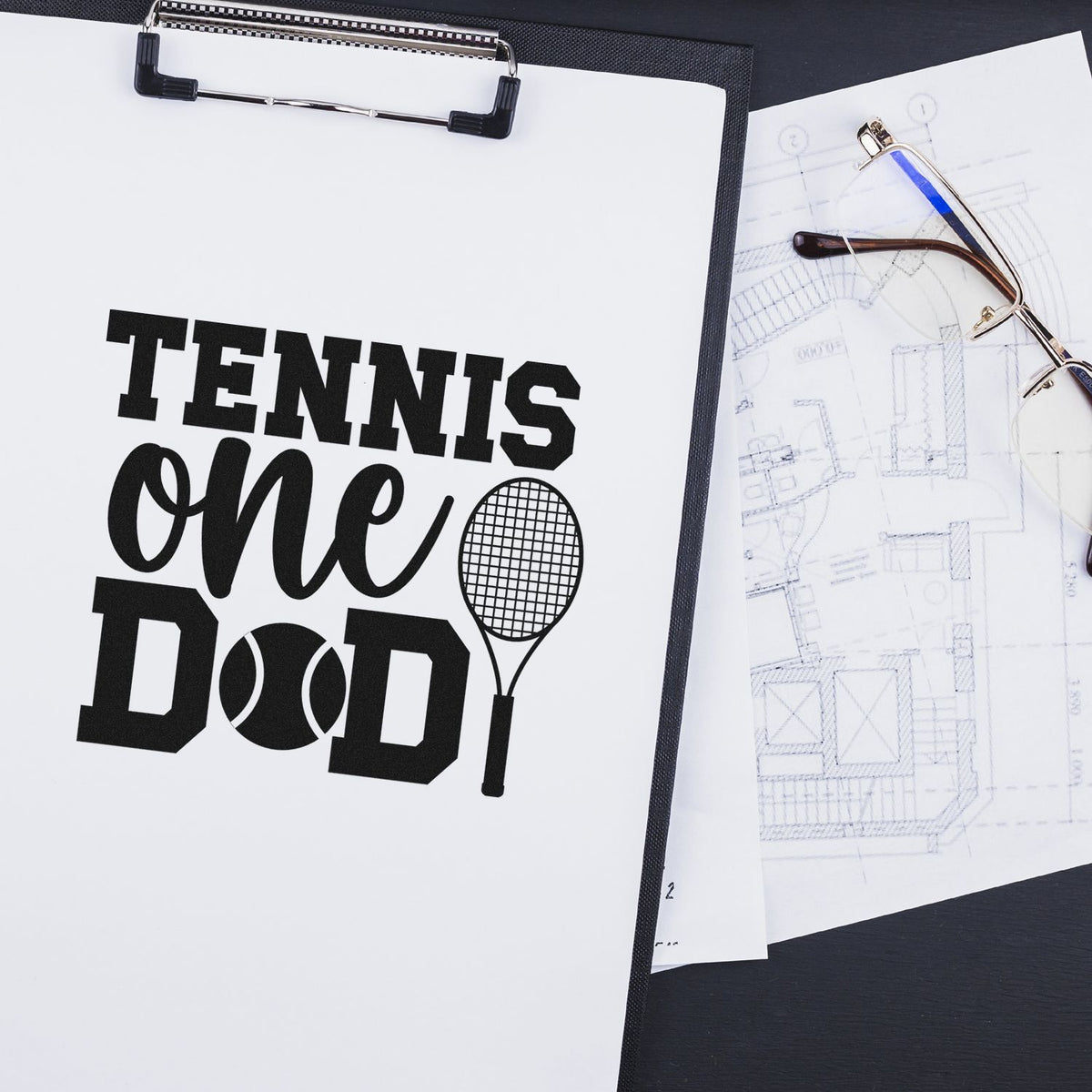 Personalized tennis rubber stamp design reading Tennis One Dad with racket and ball graphic, ideal for custom sports gifts.
