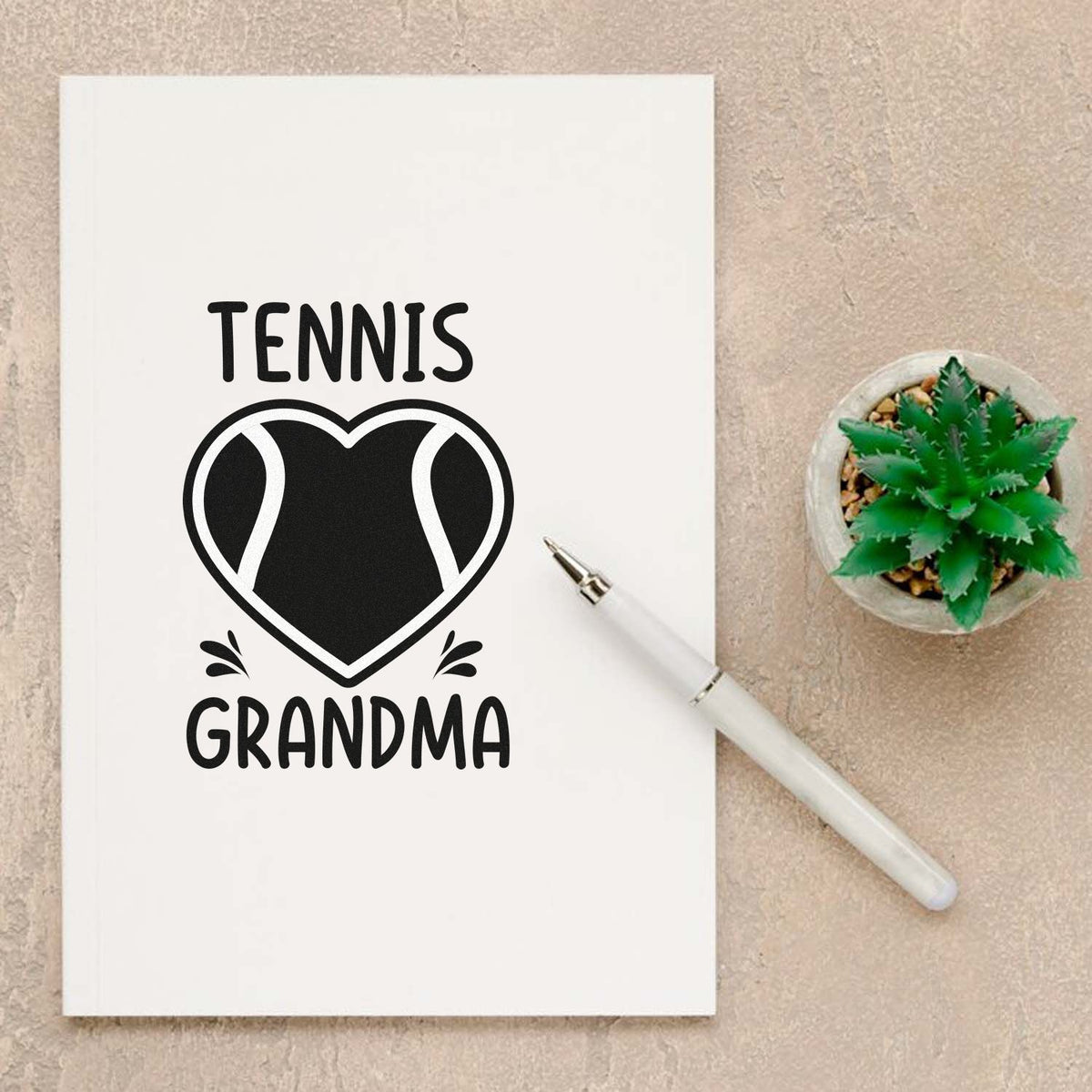 Tennis Grandma rubber stamp design with heart tennis ball graphic, ideal for personalized gifts, stationery, and craft projects.