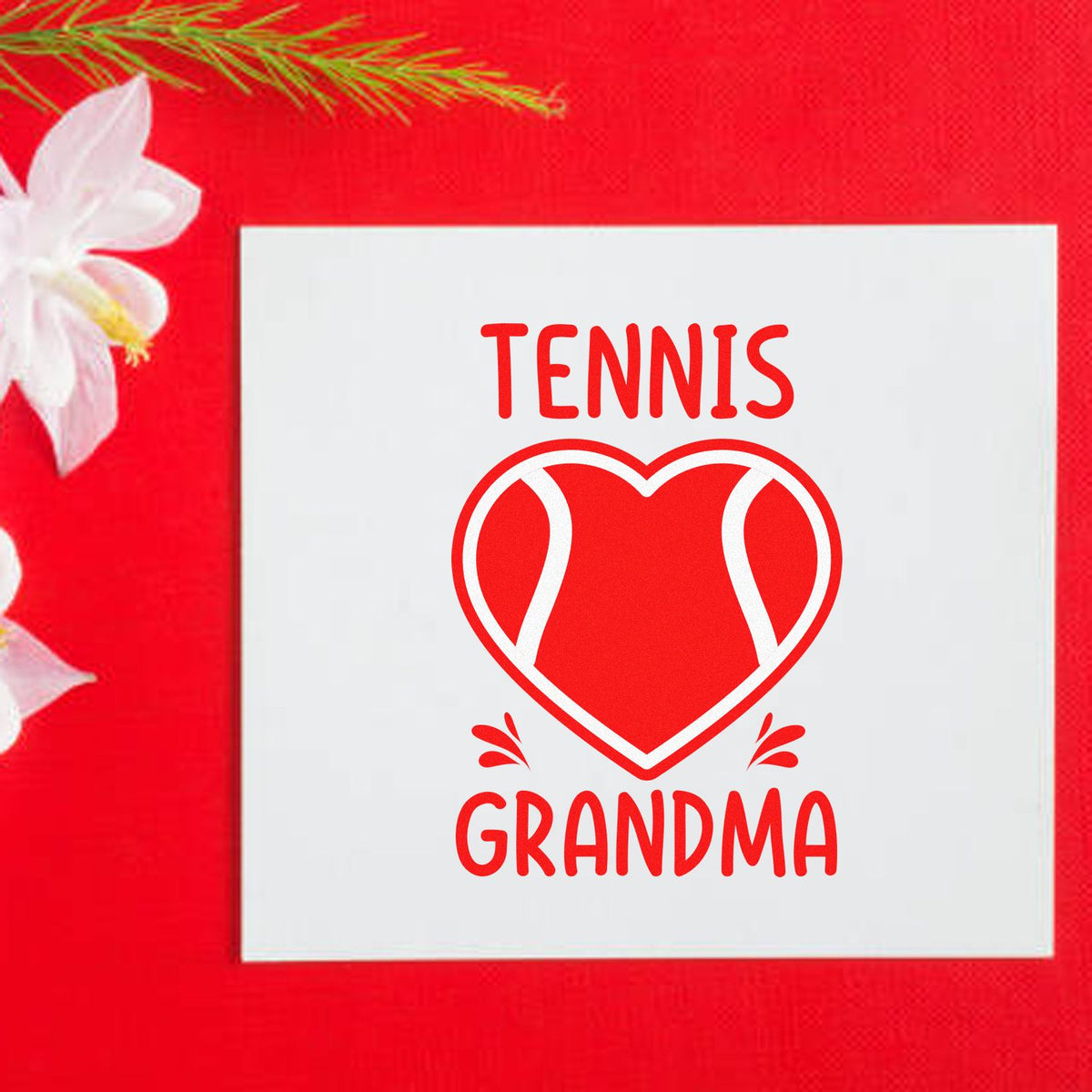 Tennis Grandma rubber stamp design with heart-shaped tennis ball graphic, perfect for custom gifts and tennis fan crafts.