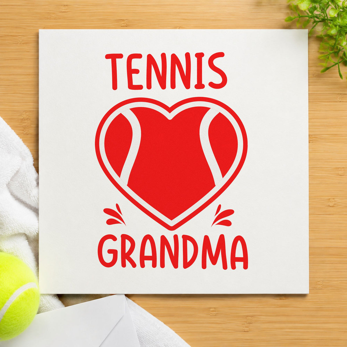 Tennis Grandma Heart Ball rubber stamp shown in red ink, stamped for projects such as bin court labels.