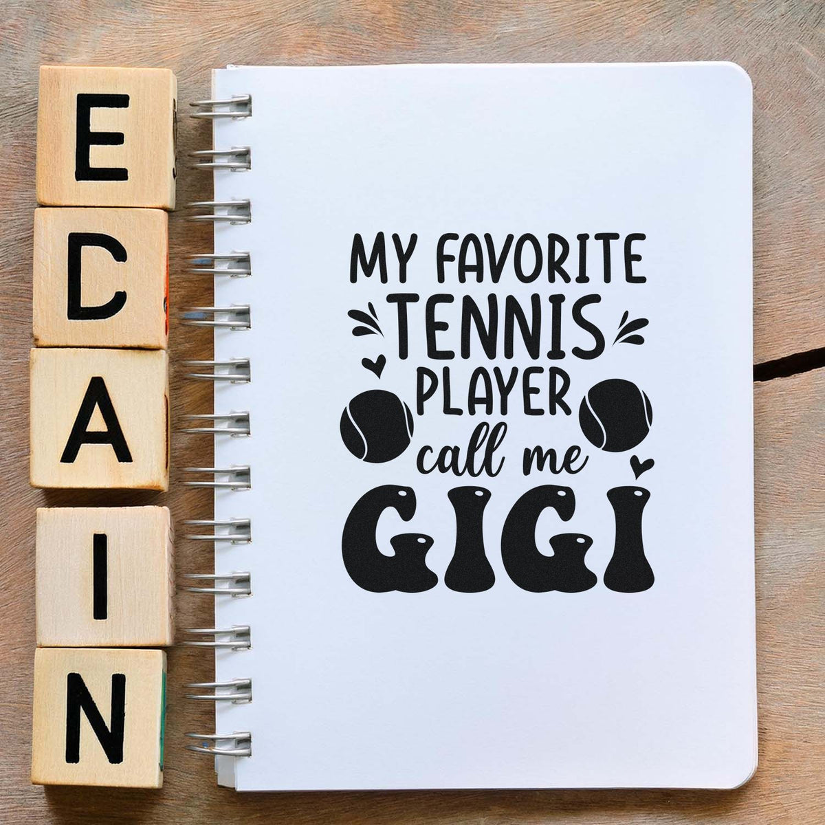 Tennis-themed custom rubber stamp design reading My Favorite Tennis Player Call Me Gigi for a sporty grandma gift.