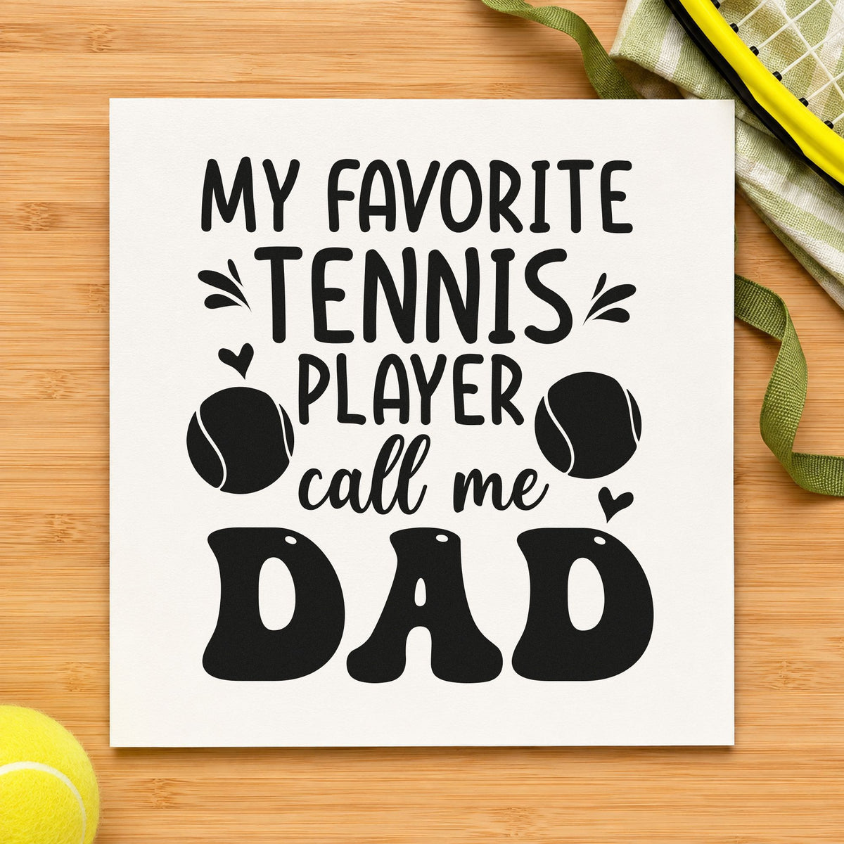 Favorite Tennis Player Dad craft stamp imprint in black ink on a handmade project, one idea being match drive tags.