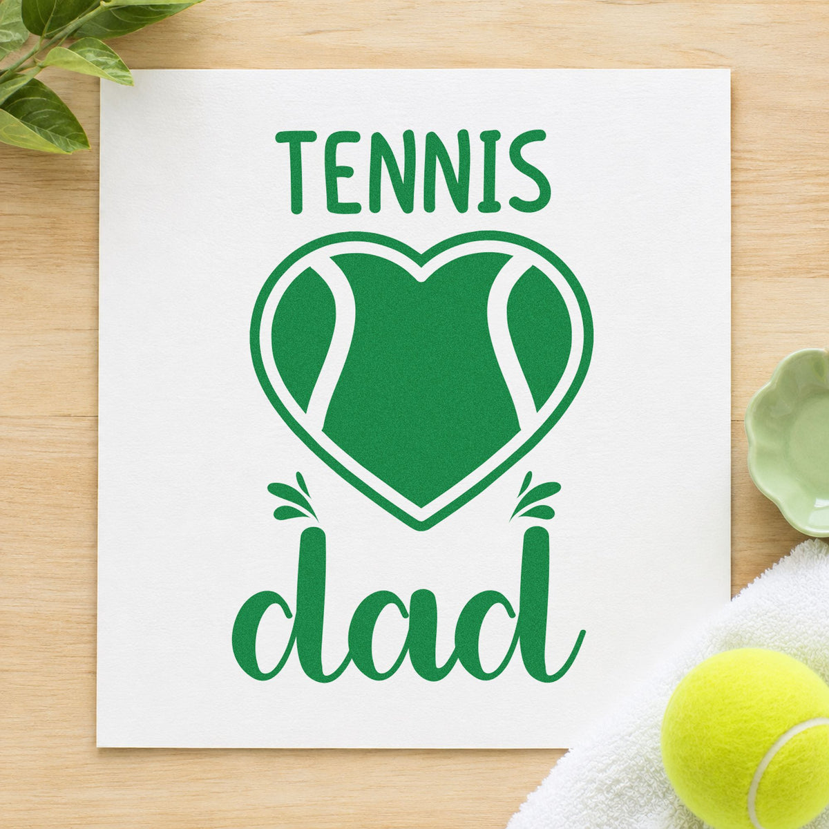 Tennis Dad Heart Ball craft stamp imprint in green ink on a handmade project, one idea being player note cards.