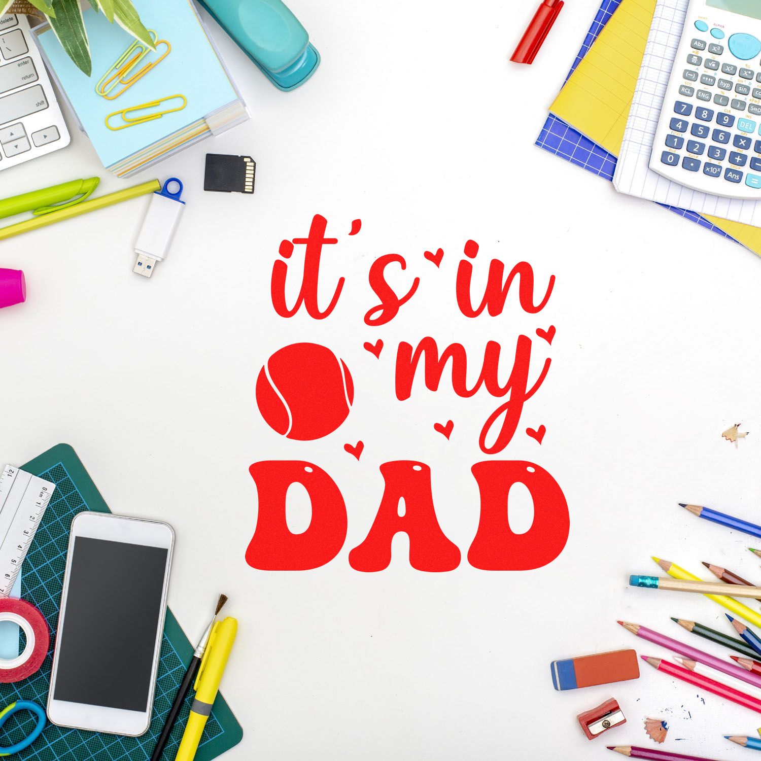 Fathers Day rubber stamp design reading its in my DAD with sporty ball graphic, surrounded by school and office supplies.