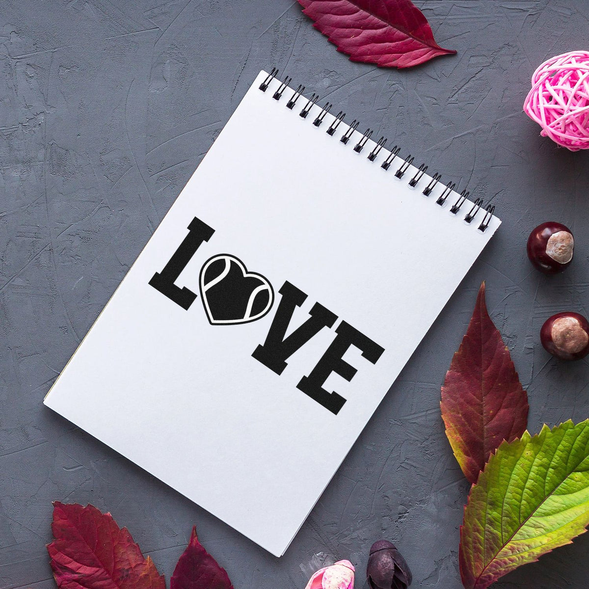 LOVE heart rubber stamp impression on notebook, perfect for DIY crafts, wedding stationery, and handmade cards.