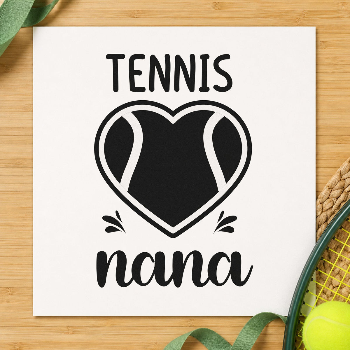 Tennis Nana Heart Ball craft stamp imprint in black ink on a handmade project, one idea being bake tin gift tags.