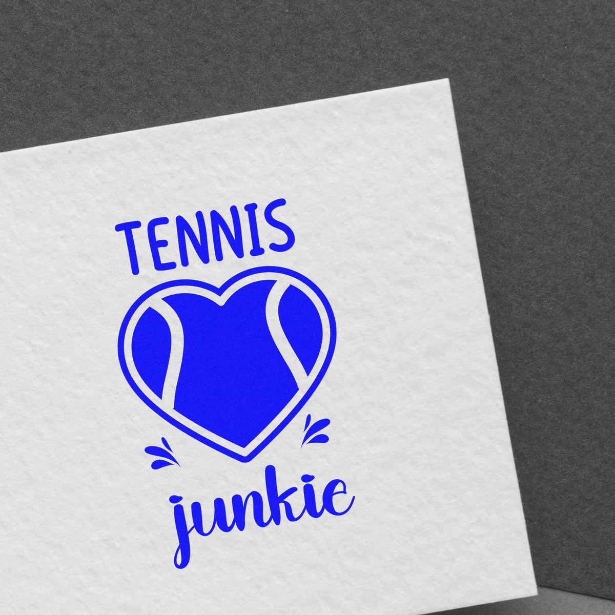 Tennis junkie rubber stamp with heart-shaped tennis ball design for sports-themed crafts and gifts