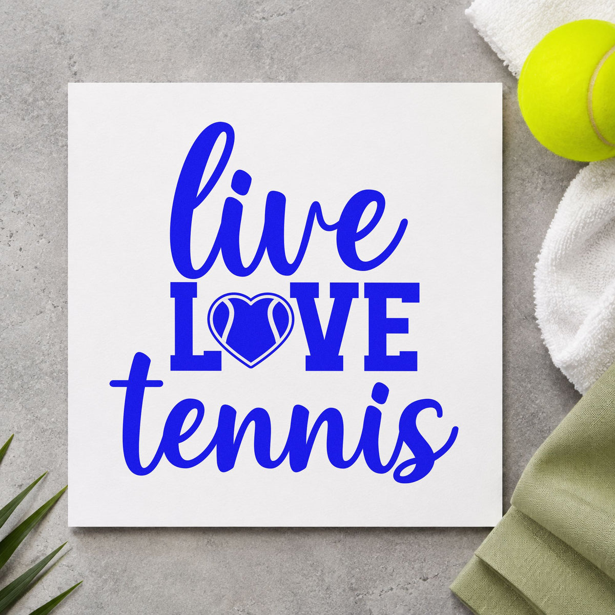Live Love Tennis Heart craft stamp imprinted in blue ink on paper, a design suited to framed café corner.
