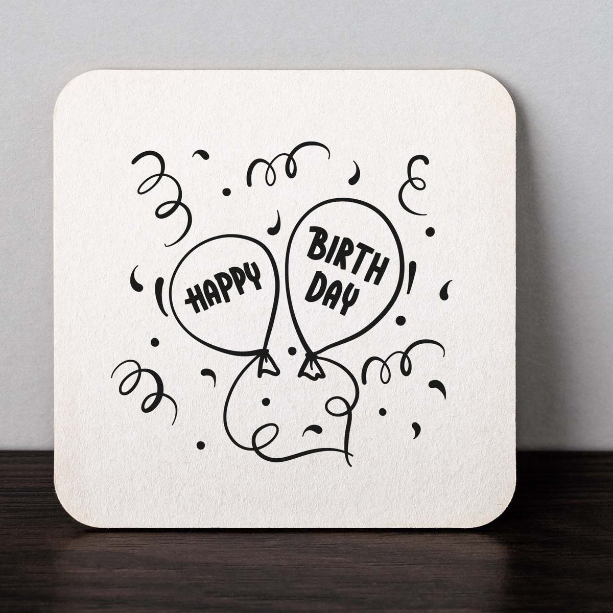 Happy Birthday Balloon Pair Compact Pre-Inked Stamp – Slim imprint stamped in black ink. Two balloons read HAPPY and BIRTH DAY amid curling strings and confetti.