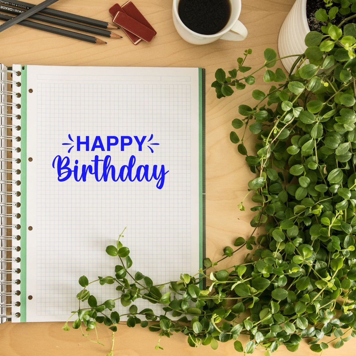 Happy Birthday rubber stamp mockup on a notebook page, ideal for birthday card designs and planner decor.