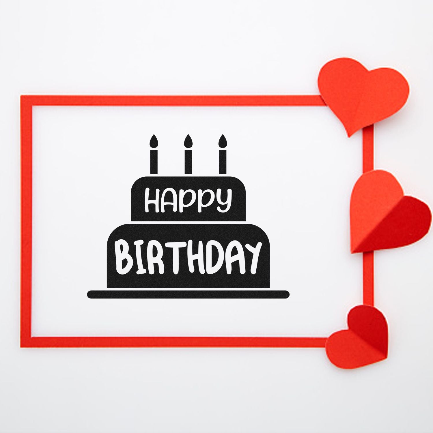 Happy birthday rubber stamp design with cake and candles, framed by red hearts for cards and crafts.