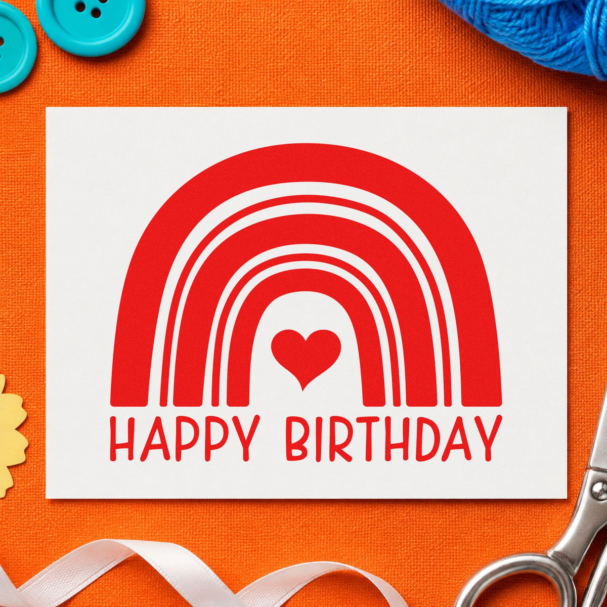 Happy Birthday Heart Rainbow craft stamp imprint in red ink on a handmade project, one idea being shade game cards.