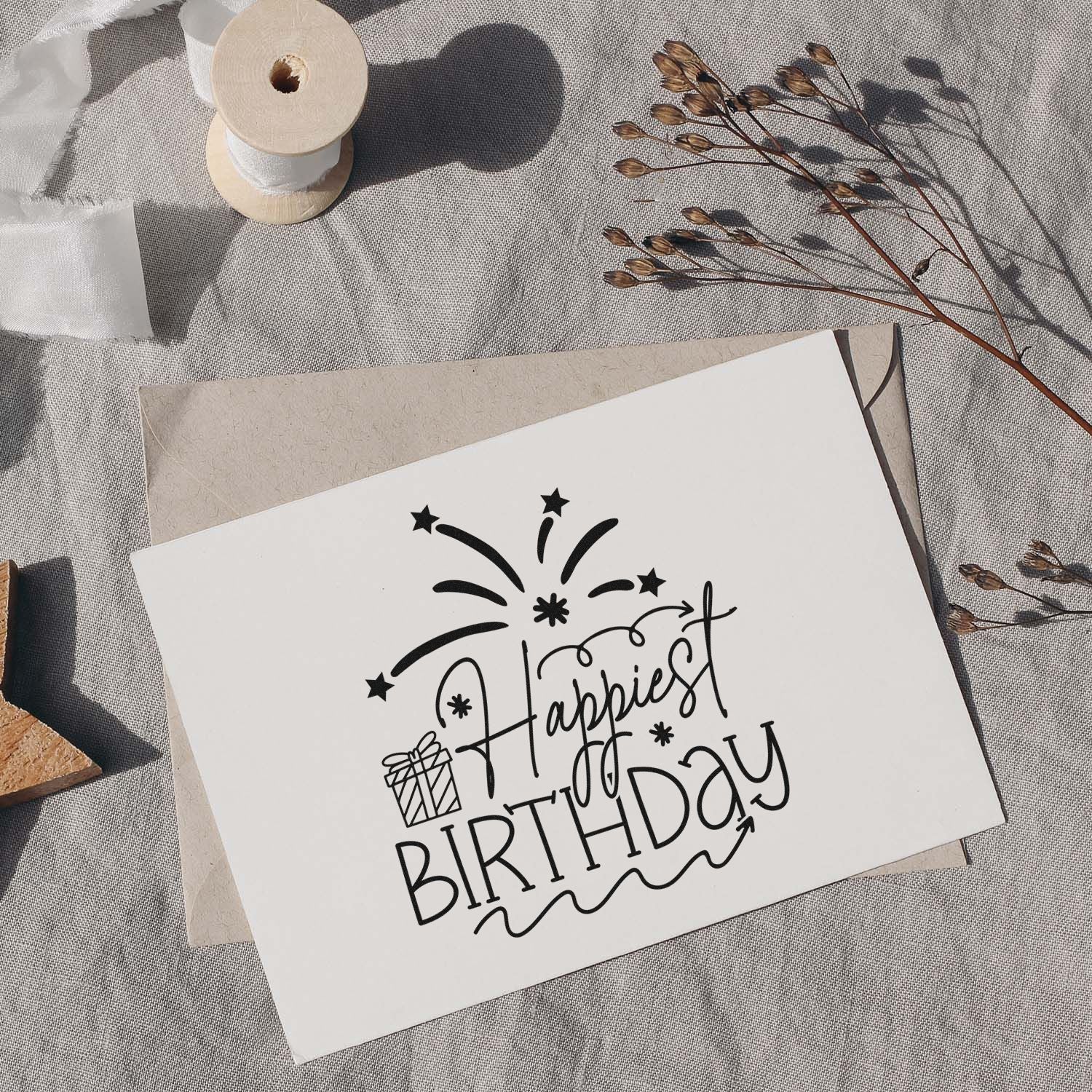 Happiest Birthday rubber stamp design on greeting card with fireworks and gift icon for handmade birthday cards.