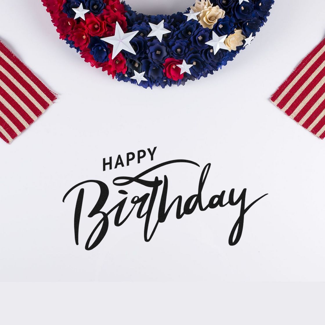 Happy Birthday rubber stamp design with patriotic red, white and blue floral wreath for card making and celebration crafts.