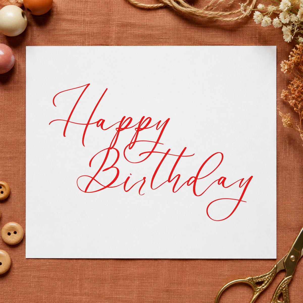Elegant Happy Birthday Calligraphy craft stamp imprint in red ink on a handmade project, one idea being proof note cards.