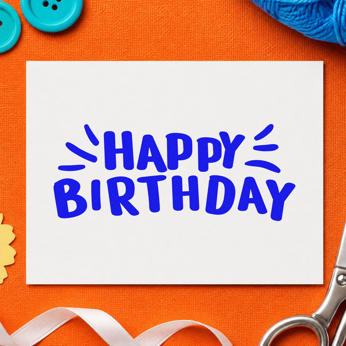Happy Birthday Radiating Strokes craft stamp imprinted in blue ink on paper, a design suited to framed party room.