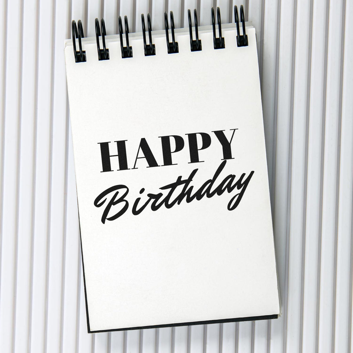Happy Birthday Serif Brush Script Lettering Stamp - Premium Vintage Pro Wooden imprint stamped in black ink. HAPPY appears in large bold serif capitals above a slanted brush-script Birthday.