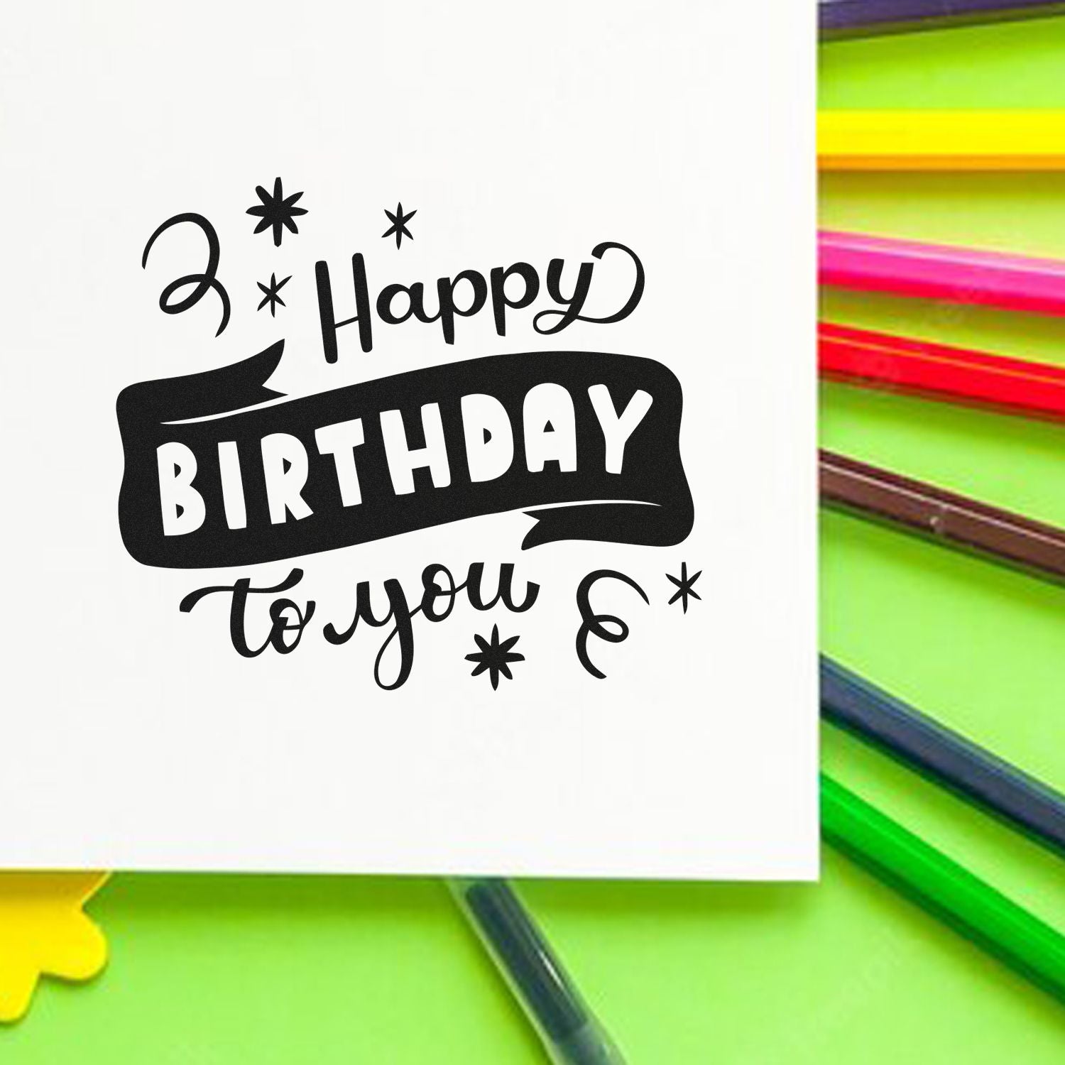 Happy Birthday to You rubber stamp for birthday cards, shown stamped on white paper with colorful pencils.