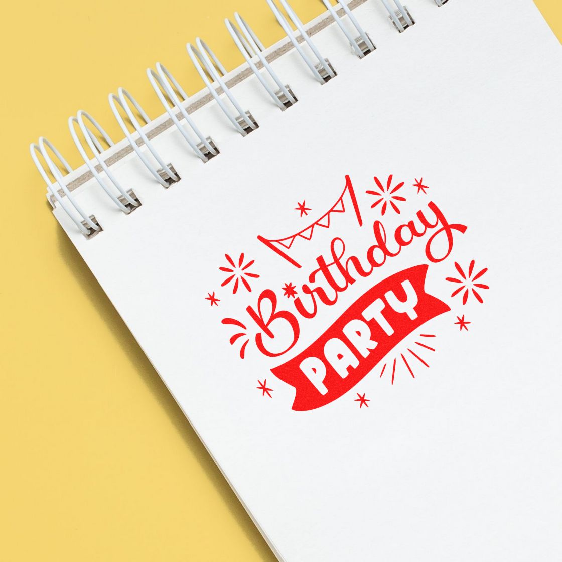 Birthday party rubber stamp design on a notebook page for festive invitations, scrapbooking, and celebration branding.