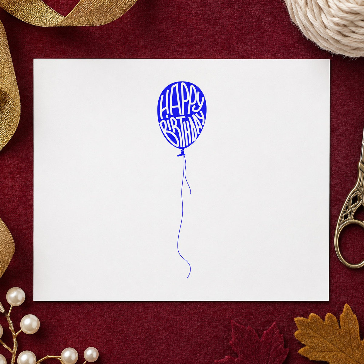 Happy Birthday Single Balloon craft stamp in purple ink on cardstock, an easy option for tote panel printing.