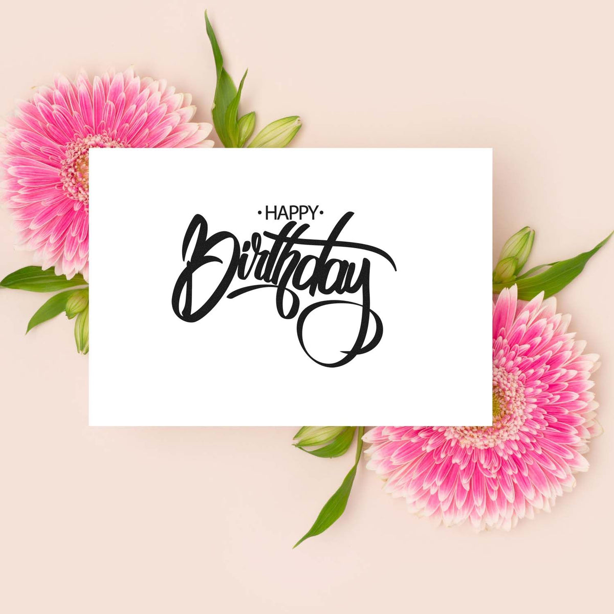 Happy Birthday script rubber stamp mockup with pink floral accents for birthday cards, crafts, and packaging