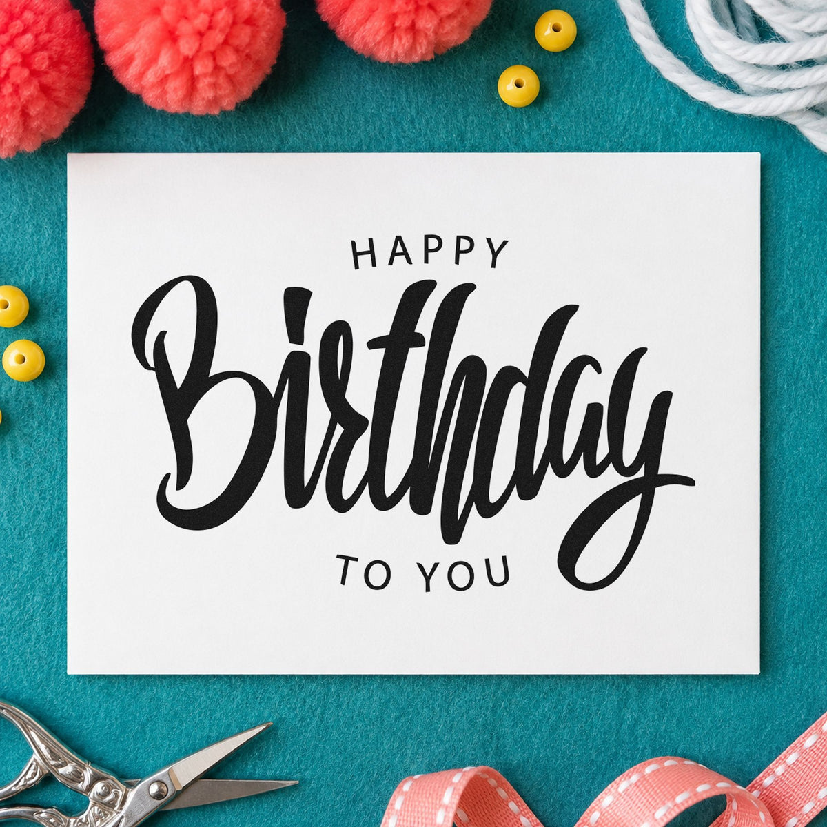 Happy Birthday To You craft stamp imprint in black ink on a handmade project, one idea being book prize gift tags.