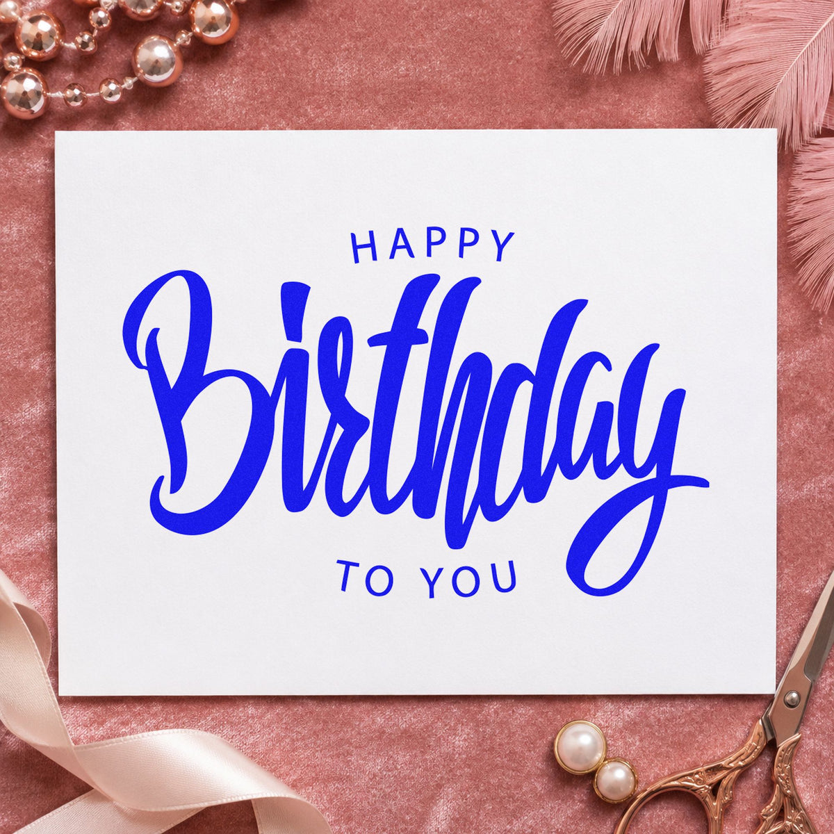 Happy Birthday To You craft stamp imprinted in blue ink on paper, a design suited to framed school hall.