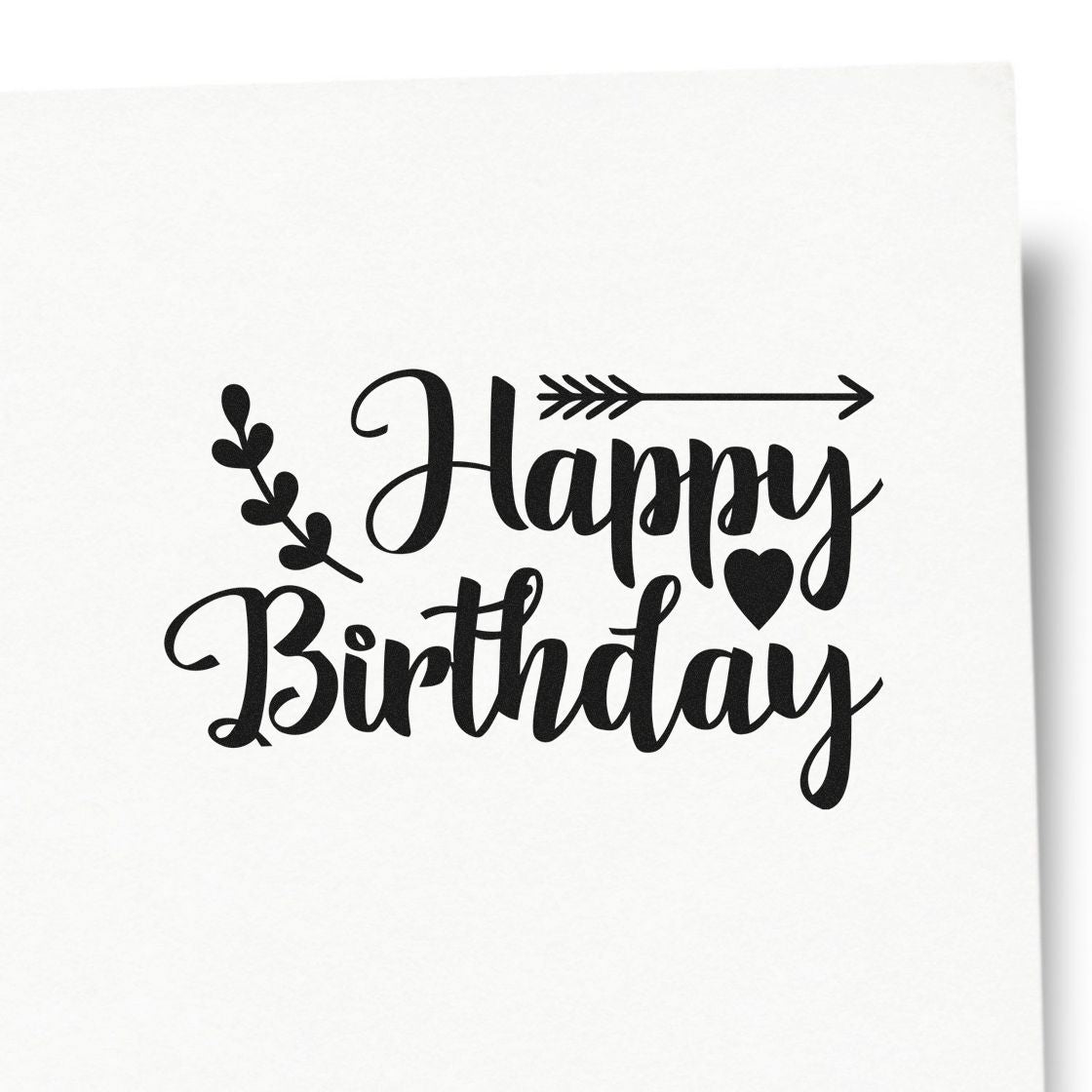 Birthday Arrow Leaf Hearts Botanical Sprig PSI Pre-Inked Stamp imprint stamped in black ink. Happy Birthday appears with a right-pointing arrow, a leafy sprig, and a solid heart.