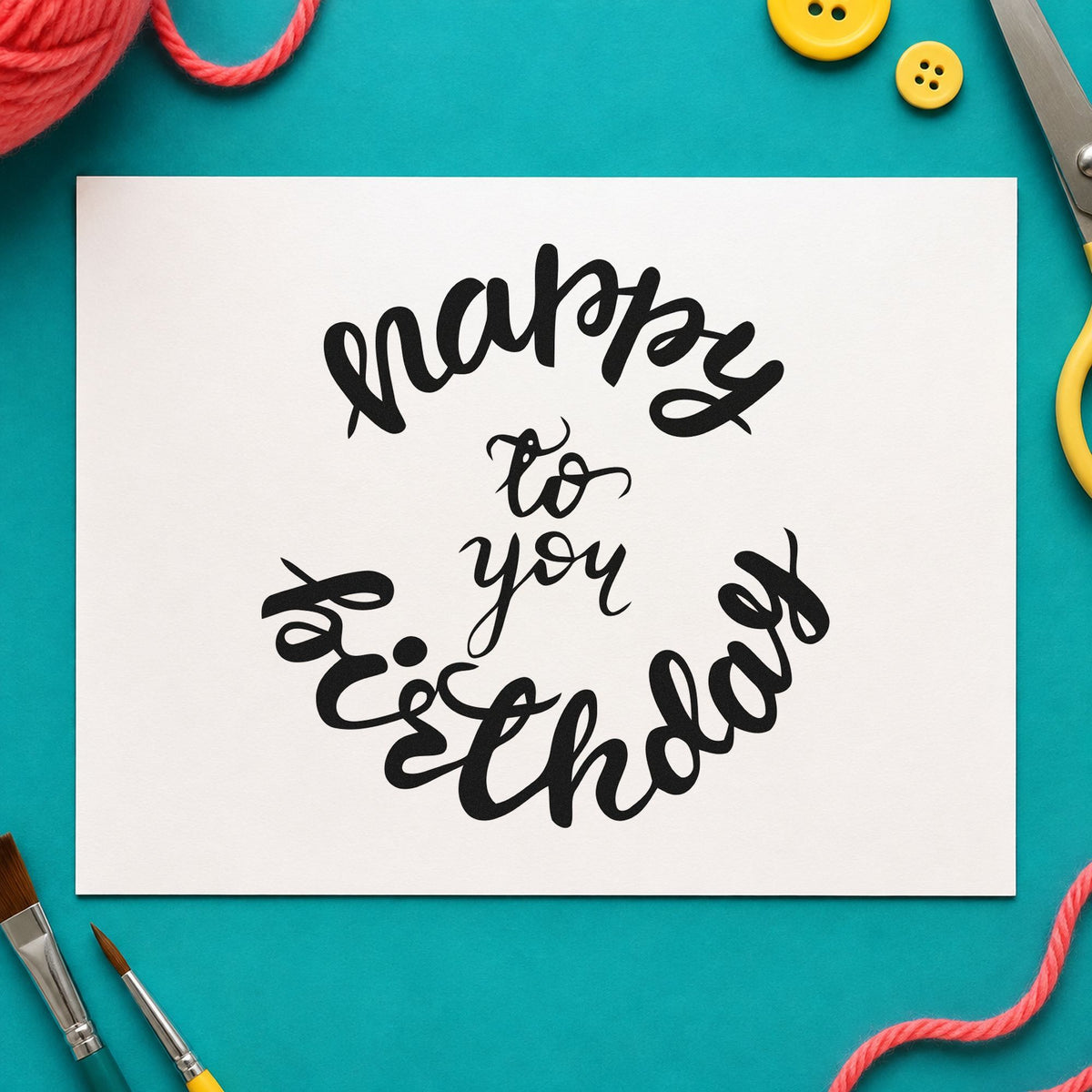 Happy Birthday Circular Script craft stamp imprint in black ink on a handmade project, one idea being drink token gift tags.
