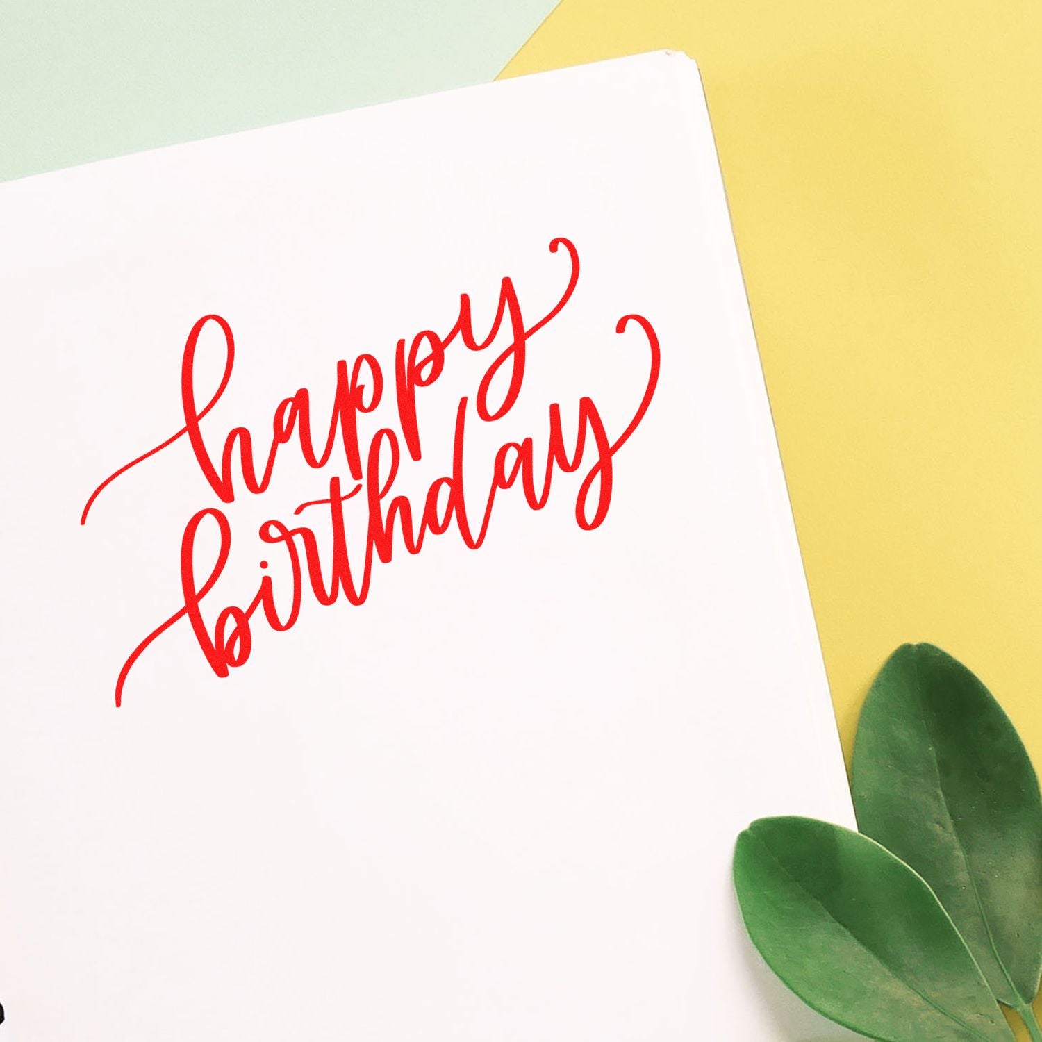 Happy Birthday rubber stamp in red script for handmade birthday cards, invitations, and craft projects.