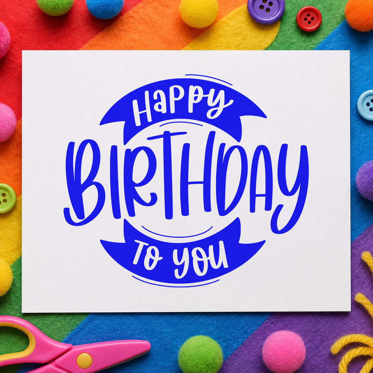 Birthday To You Ribbon craft stamp in blue ink on cardstock, an easy option for travel blanket printing.