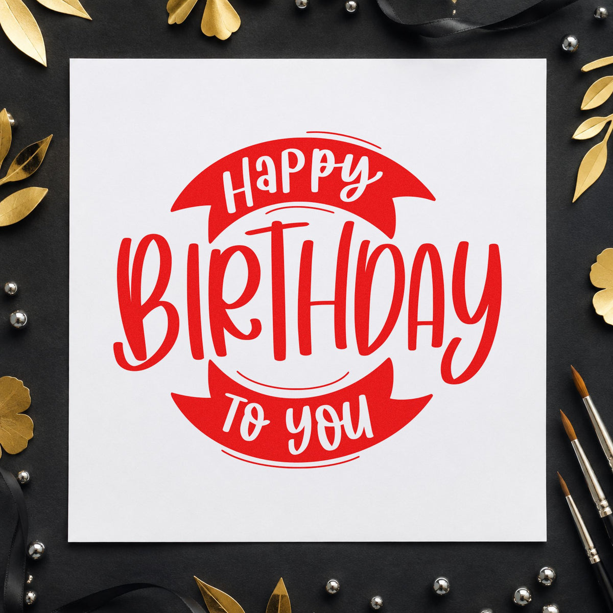 Birthday To You Ribbon craft stamp imprint in red ink on a handmade project, one idea being leg note cards.