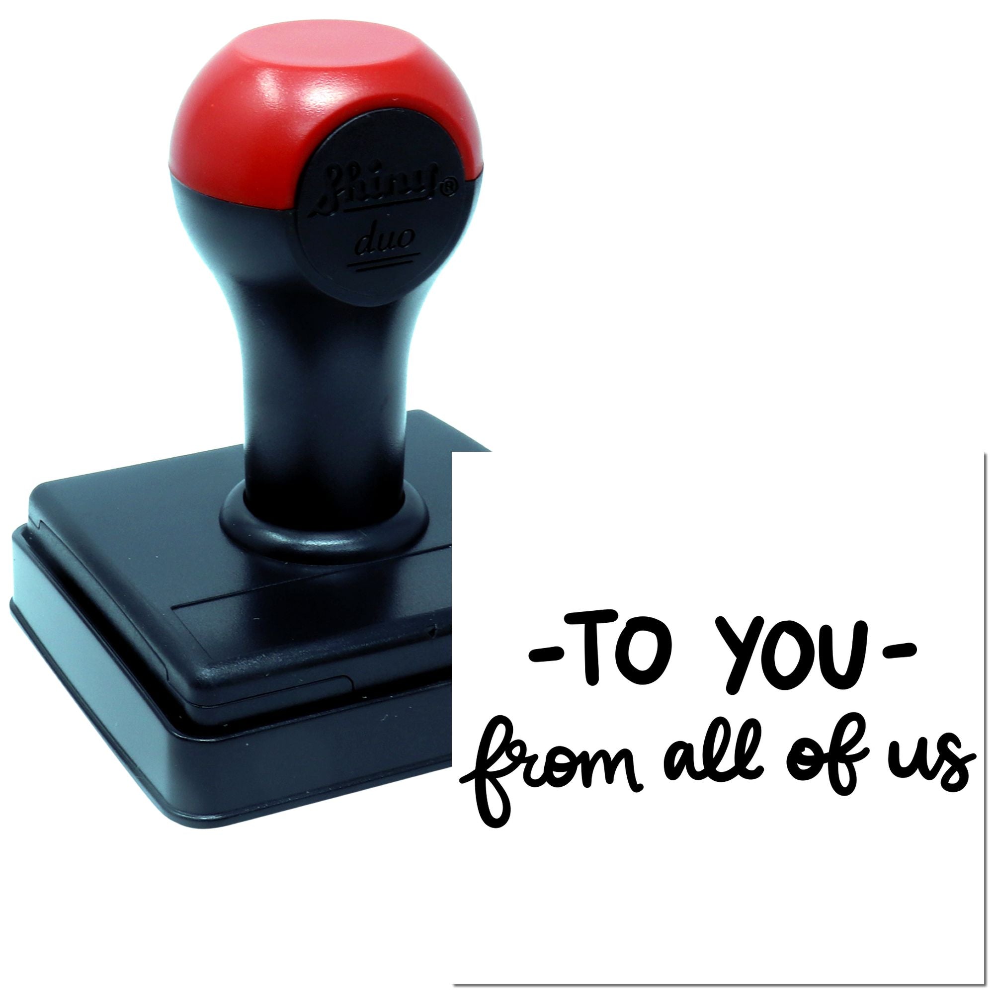 Self-inking rubber stamp with To You From All of Us message for personalized greeting cards and gift packaging.